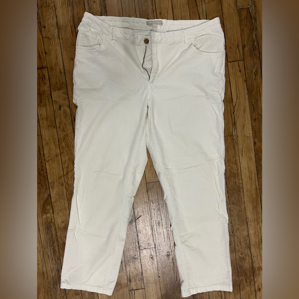 Women stretch white pants